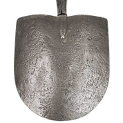 Closeup of textured forged steel blade head of Caprock irrigation shovel.