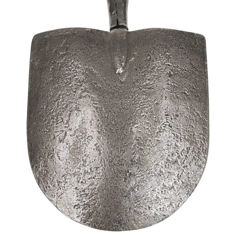 Closeup of textured forged steel blade head of Caprock irrigation shovel.