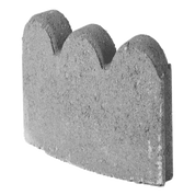 Gray concrete scalloped edging for landscaping.
