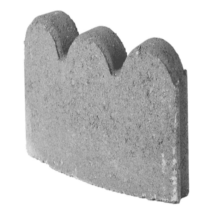 Gray concrete scalloped edging for landscaping.
