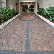 Plaza Giant Rectangle 9x11 pavers, 60mm, multi-color brick pattern driveway design.
