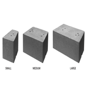 Gray concrete wall blocks in small, medium, and large sizes.
