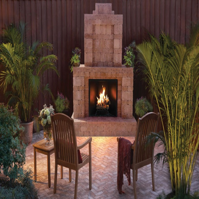 Outdoor brick fireplace with seating area, perfect for evening ambiance.
