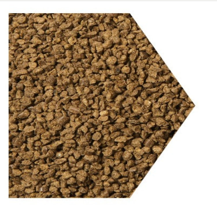 Brown granular starter fertilizer, close-up view.
