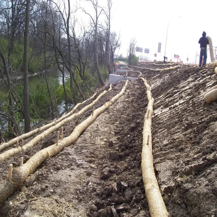 Straw wattles for erosion control on a sloped embankment.

