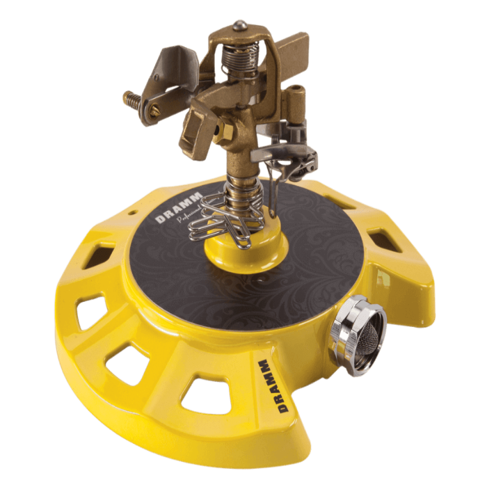 Yellow circular sprinkler with brass accents, designed for even water distribution.
