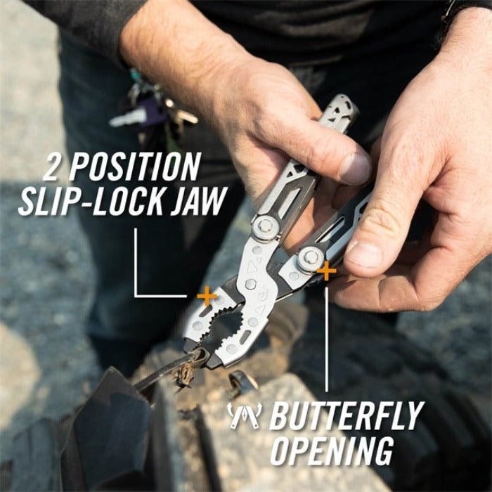 Close-up of hands using pliers with a slip-lock jaw, showcasing its butterfly opening mechanism.
