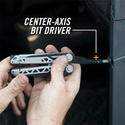 Hands using multi-tool's bit driver to tighten a screw.
