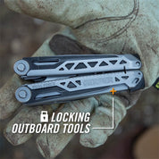 Gray and black multi-tool with locking outboard tools, held in work gloves.
