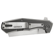 Gray and silver folding utility knife with textured handle detail.
