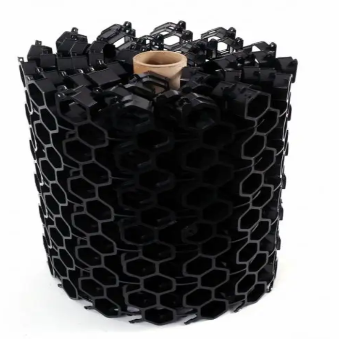 EZ Roll black plastic grass pavers, honeycomb design, easy installation.
