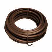 Brown steel edging trim, coiled and ready for landscaping projects.
