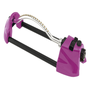 Purple oscillating sprinkler with adjustable spray pattern.
