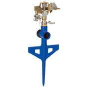 Blue plastic and brass circular sprinkler head on a pointed stake for efficient lawn watering.
