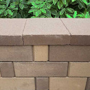 4" Rectangle Concrete Cap, brown and beige, for retaining walls and landscaping.
