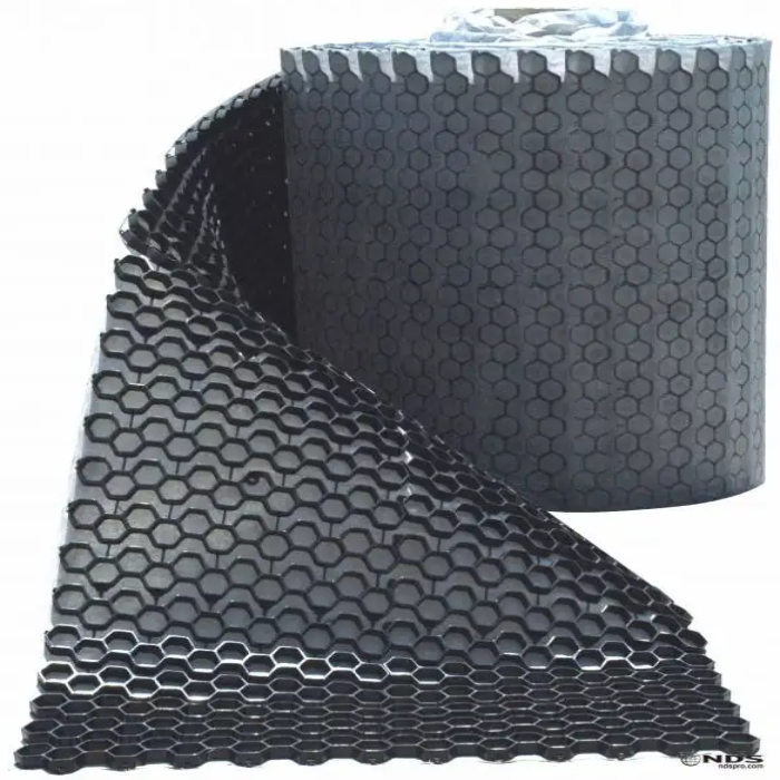 Black plastic honeycomb gravel paver roll for driveways and patios.
