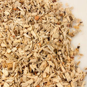 Light beige playground mulch pile, close-up view.
