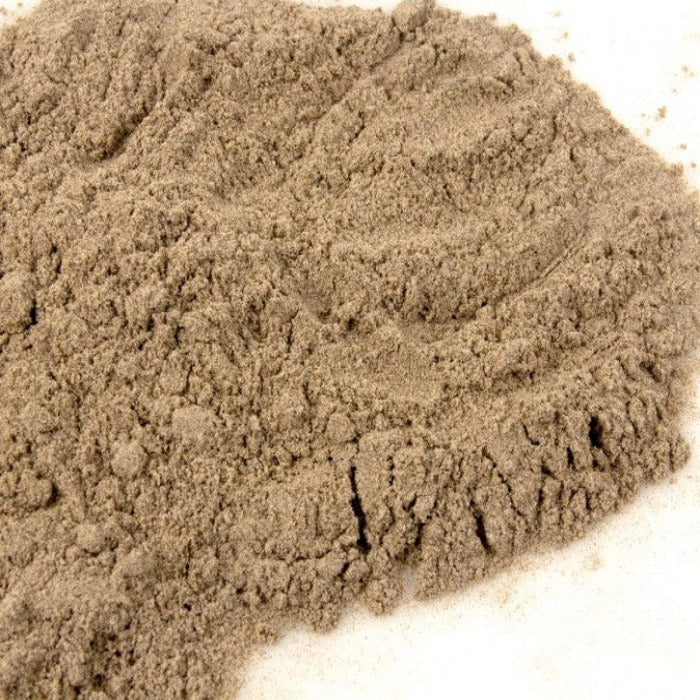 Light brown playground sand pile on white background
