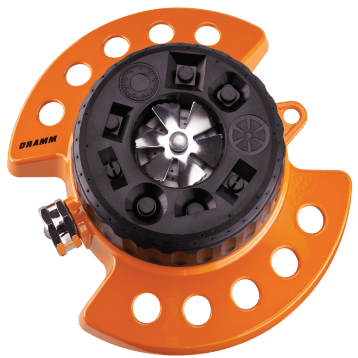 Orange plastic sprinkler head with adjustable spray patterns.
