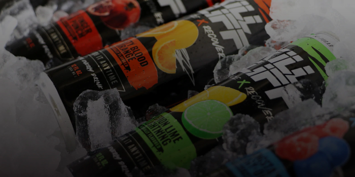 Kill Cliff Recover:  Energy drink cans in blood orange, lemon lime, and other flavors, chilling in ice.
