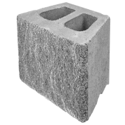 Gray concrete retaining wall block with two holes.

