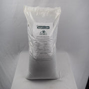 Large bag of organic fertilizer with product details visible on label.
