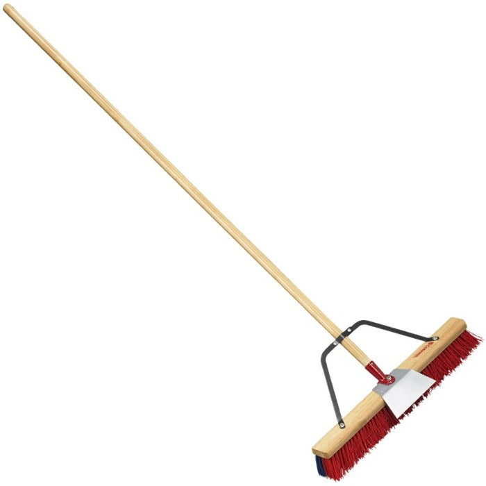 Corona Push Broom with 2-bristle head and long wooden handle for efficient sweeping.
