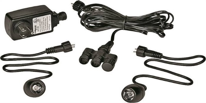 LED lighting kit components: transformer, connecting wires, and two LED lights.
