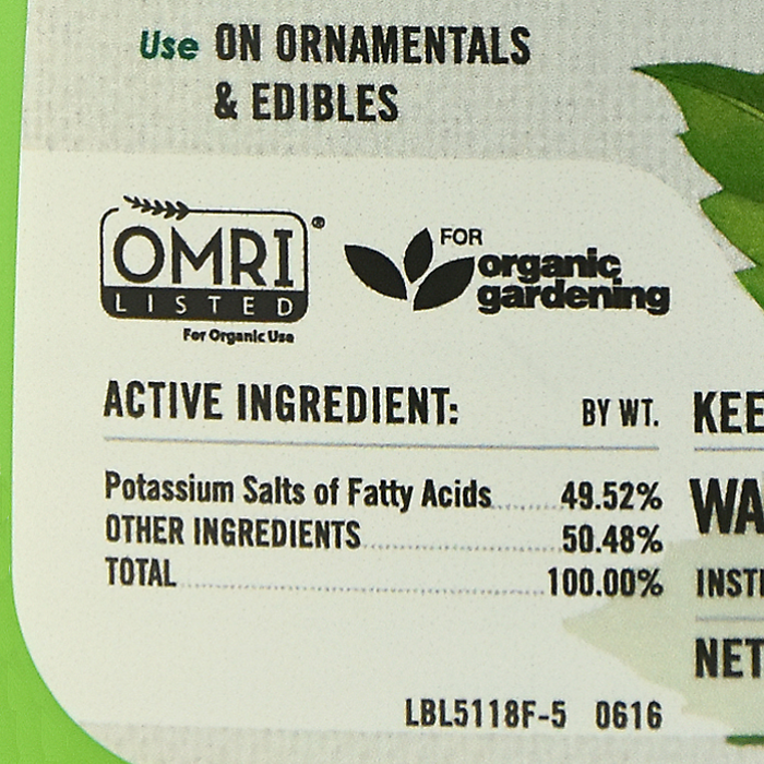 Organic insect soap label showing ingredients: 49.52% potassium salts of fatty acids, OMRI listed.
