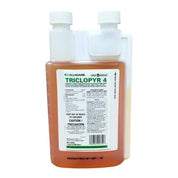 Amber herbicide bottle with detailed product label and usage instructions.
